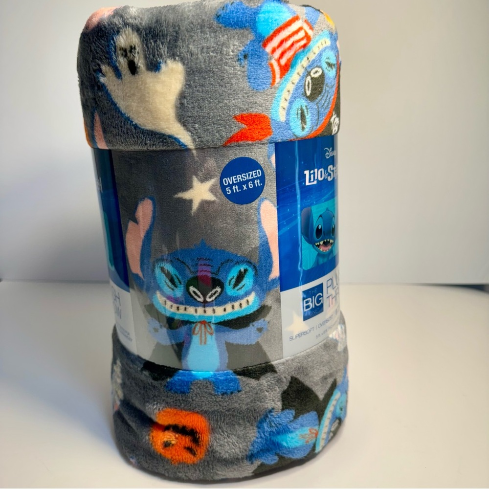 NWT. Disney Stitch Halloween plush Throw. The gray Blanket. Stitch in costumes
